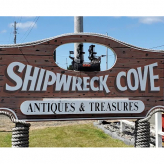 Shipwreck Cove Antiques & Treasures logo