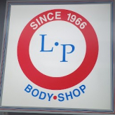 L.P. Body Shop logo